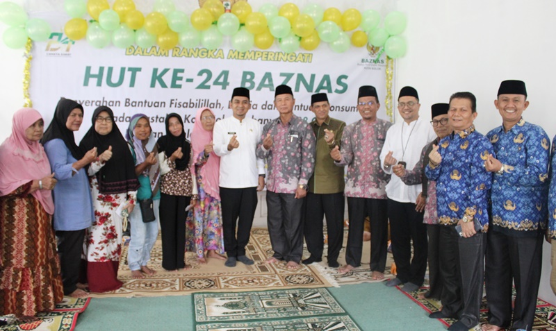 Peringati HUT ke-24, BAZNAS Kota Solok Salurkan Zakat dan Bantuan BPJS Ketenagakerjaan kepada 438 KPM